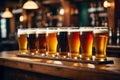 Glasses with craft beer on wooden bar. Royalty Free Stock Photo