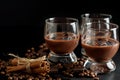 Glasses of cream coffee cocktail or chocolate martini on black b Royalty Free Stock Photo