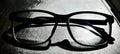 Glasses in dark shadow black night Royalty Free Stock Photo