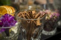 Glasses decorated dried fruits on the bar counter. Closeup cinnamon. Food photo