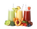 Glasses of delicious juices and fresh ingredients on white background Royalty Free Stock Photo