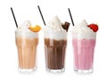 Glasses with milk shakes on white background Royalty Free Stock Photo