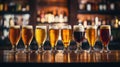Glasses with different sorts of craft beer on wooden bar. Royalty Free Stock Photo