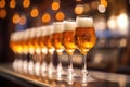 Glasses with different sorts of craft beer on wooden bar Royalty Free Stock Photo