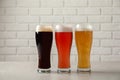 Glasses with different types of cold tasty beer Royalty Free Stock Photo
