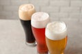 Glasses with different types of cold tasty beer Royalty Free Stock Photo