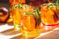 Glasses with drops of sweet peach iced tea Royalty Free Stock Photo