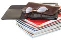 Glasses eBook reader pile of books, isolated Royalty Free Stock Photo