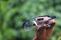 Glasses equipped with eye blink sensor module. Electronic component that can detect the blinking of eyes Royalty Free Stock Photo
