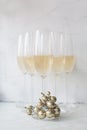 Glasses festive Christmas champagne with gold glittery decoration