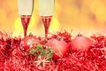 Glasses figure red Xmass bauble on blur background Royalty Free Stock Photo