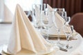 Table with glasses and napkins served for dinner in restaurant Royalty Free Stock Photo