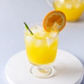 Glasses of Fresh Orange Juice on White Wooden Tray Blue Background Square Royalty Free Stock Photo