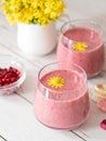 Glasses with frozen cranberry smoothie. Healthy and nutritious milkshake. Royalty Free Stock Photo