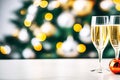 Glasses full of champagne, sparkling wine against the backdrop of Christmas twinkling lights. Festive background Royalty Free Stock Photo