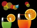 Glasses with green and orange drink