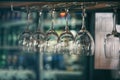 Glasses hanging on bar counte Royalty Free Stock Photo