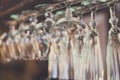 Glasses hanging on bar rack close up Royalty Free Stock Photo