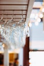 Glasses Hanging Over Bar Rack. Royalty Free Stock Photo