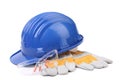 Glasses hard hat and gloves. Royalty Free Stock Photo