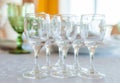 Glasses on a laid served wedding table, close-up Royalty Free Stock Photo
