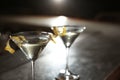 Glasses of lemon drop martini cocktail in bar. Space for text Royalty Free Stock Photo