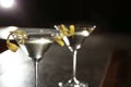 Glasses of lemon drop martini cocktail in bar, closeup. Royalty Free Stock Photo