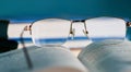 Glasses lie on a stack of books, science Royalty Free Stock Photo