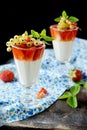 Glasses with a light creamy dessert and berries