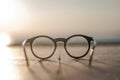 Glasses lying on a wooden table front view sundawn