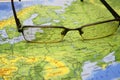 Glasses on a map of europe