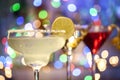 Glasses of margarita, martini and cosmopolitan cocktails