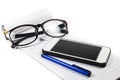 Glasses notebook pen telephone Royalty Free Stock Photo