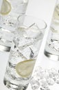 Glasses objects with soda water and ice cubes