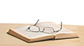 Glasses on open book Royalty Free Stock Photo