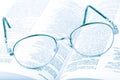 Glasses on the open book Royalty Free Stock Photo