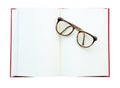 Glasses on the open book. Isolated on white (clipping path) Royalty Free Stock Photo