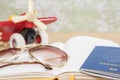 Glasses and passport on a notebook Royalty Free Stock Photo