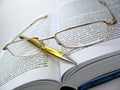 Glasses & pen on book 2 Royalty Free Stock Photo