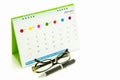 Glasses, pens, calendars