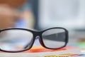 The glasses placed on the desk are pre-made glasses for working in order to increase the field of view for designers who need work