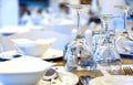 glasses plates and Cutlery on restaurant table in white close-up, traditional Greek restaurant, Europe, Greece Royalty Free Stock Photo