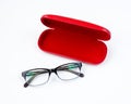 Glasses and red case on a white background Royalty Free Stock Photo