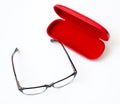 Glasses and red case on a white background Royalty Free Stock Photo