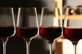 Glasses of red wine in cellar. Expensive drink Royalty Free Stock Photo