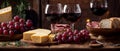 Glasses with red wine, grapes a bowl, cheese gourmet an old background food dinner delicious