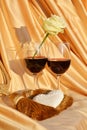 Glasses or red wine and rose, love concept Royalty Free Stock Photo