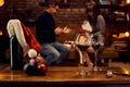 Glasses of red wine on table at home at Christmas Royalty Free Stock Photo