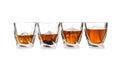 Glasses of scotch whiskey on white background