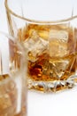 Glasses of scottish whiskey with ice cubes